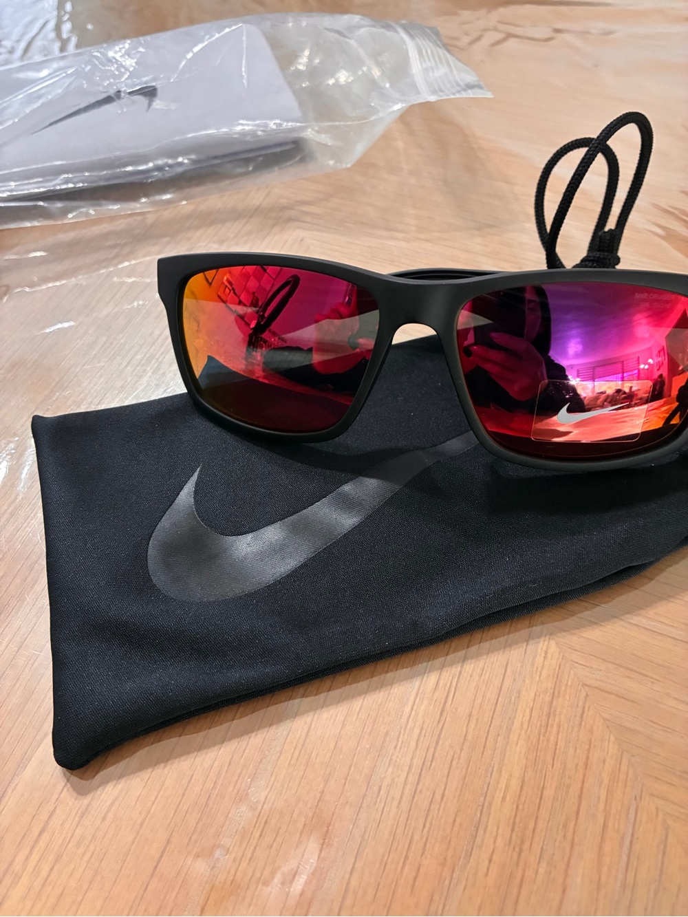 Nike Black Frame Sunglasses with Red Mirror Lenses
